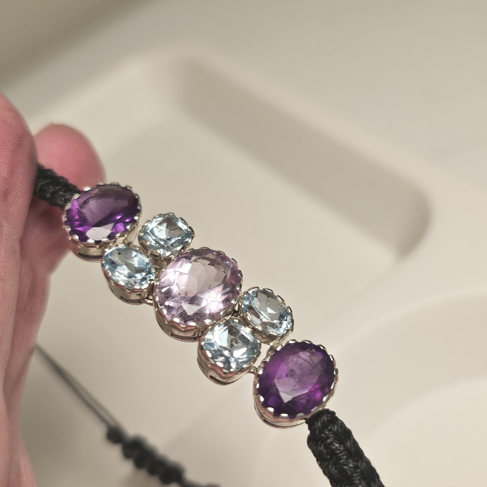 Amethyst & blue topaz bracelet, 7 faceted stones, silver artisan-made setting.
